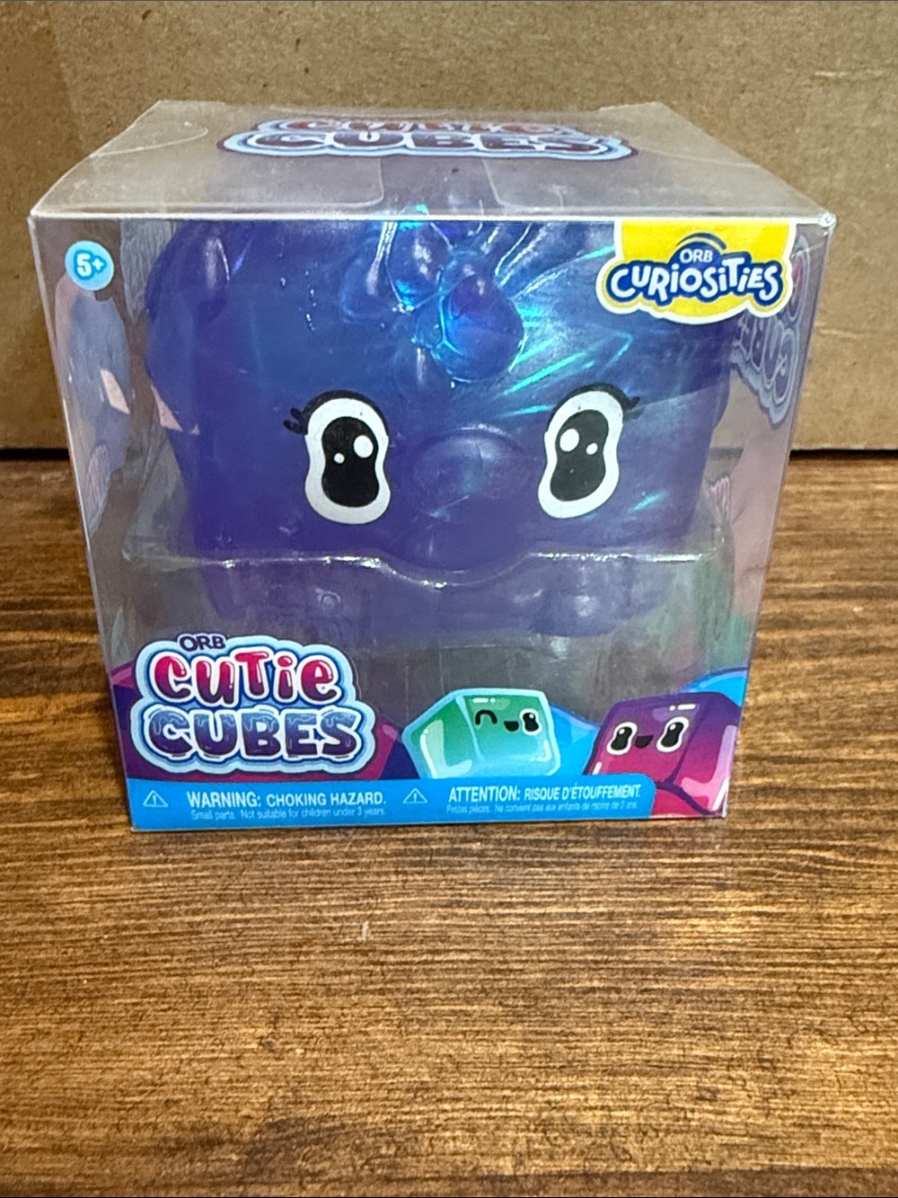 Orb Cube squishy(Cutie Cubes) color; purple iridescent.